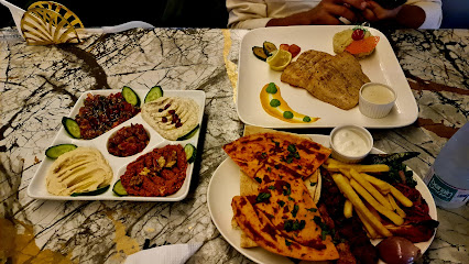 مطعم و لاونج مومنتس لاونج لحظات - جازان - +966 55 083 3088