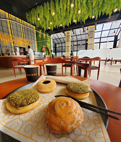 Brisko Specialty Cafe and Donuts مقهى ودونات بريسكو - بيشة -