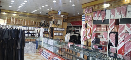 شموخ للتوريدات الرجالية - الوجه -