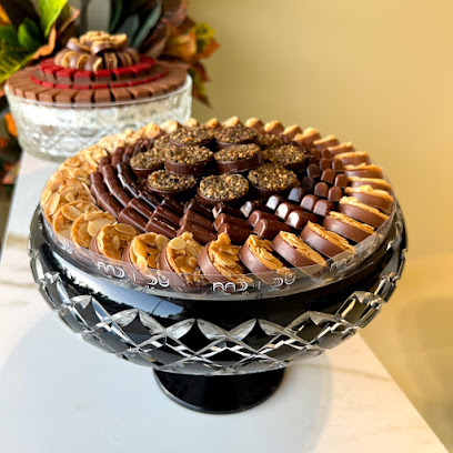 ناد شوكولا - الرياض - +966 56 600 3377